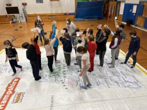 Students finding towns and regions on the map