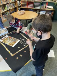 Students working on a puzzle
