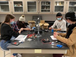 students working in science classroom