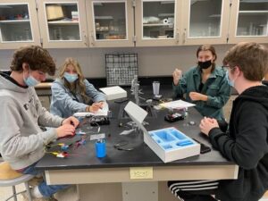 4 students in science class