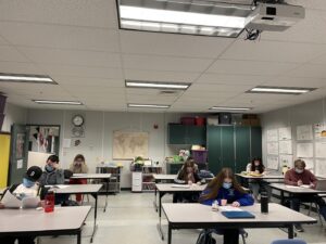 Students in class reading