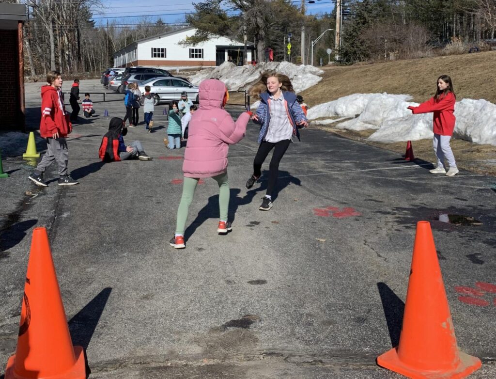 students playing freeze tag