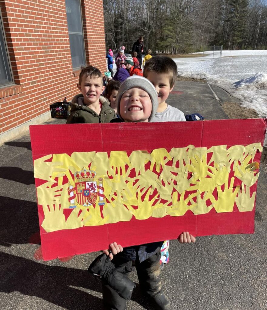 student holding flag