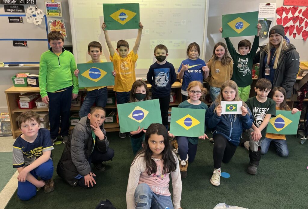 students displaying their flags