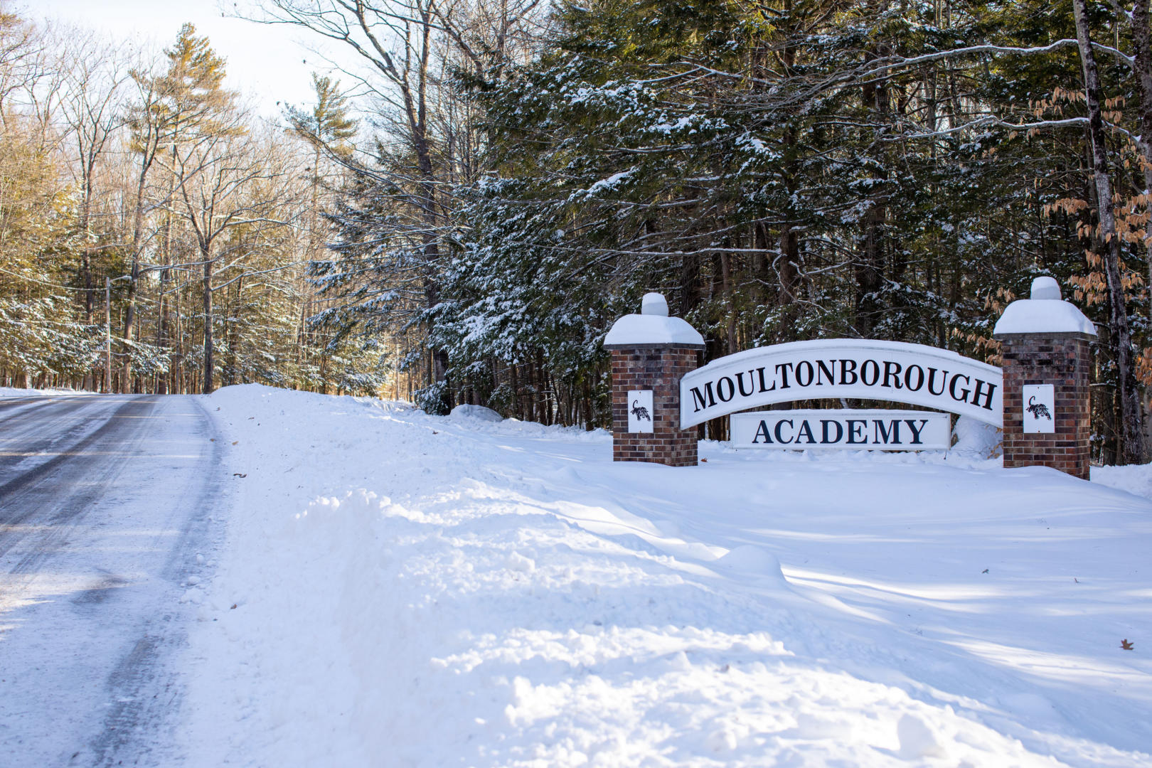winter picture of MA sign