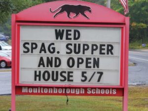 Sign with spaghetti supper date