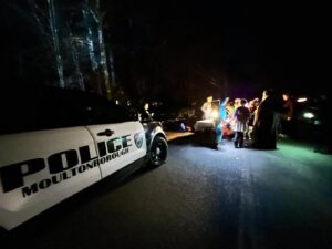 SRO Cloutier and Sgt. Beede handing out candy