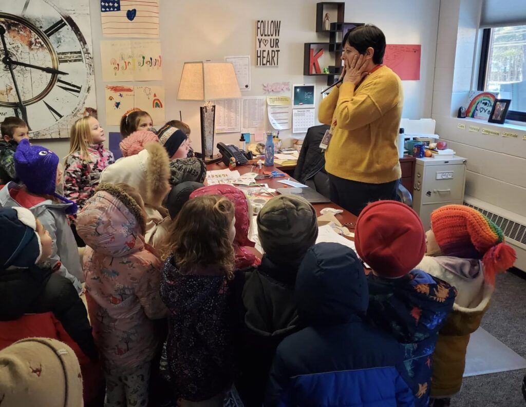 students telling the principal that their gingerbread cookies were missing