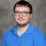 man in blue shirt