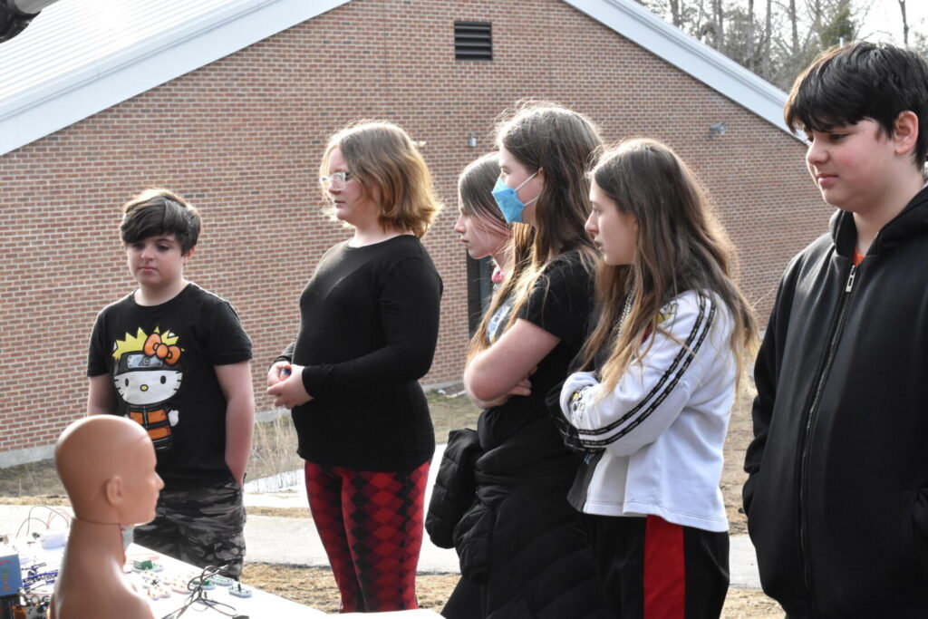 Students observing speaker