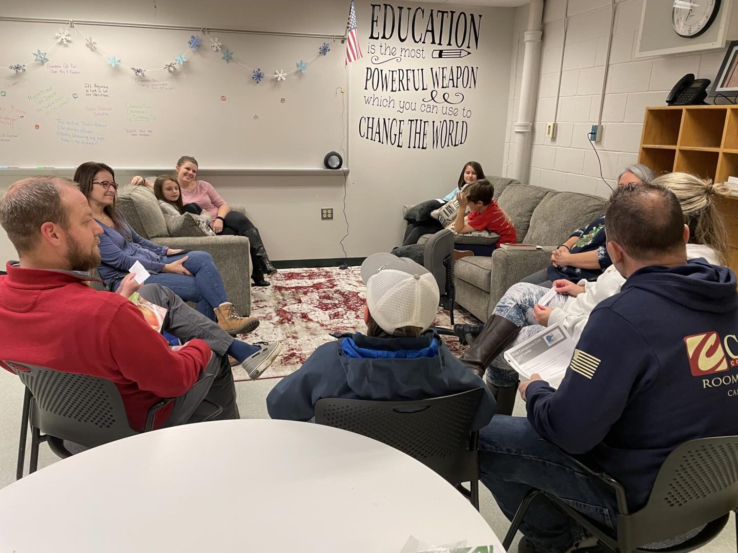 students and parents in a breakout group