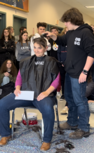 Cody shaving Meredith's head
