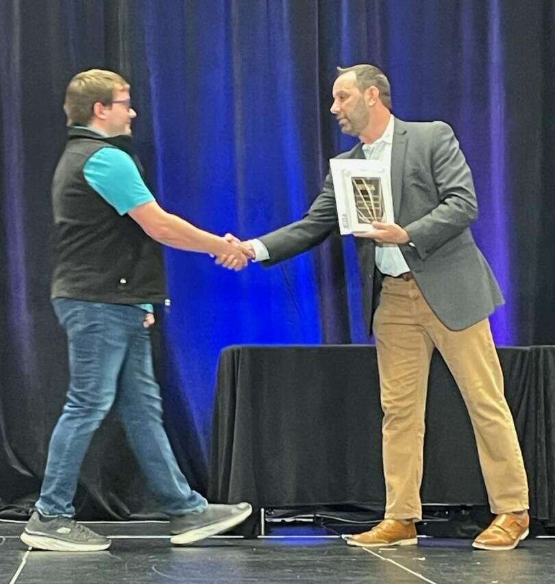 Zachary Glennon receiving ITEEA Award for Moultonborough Academy