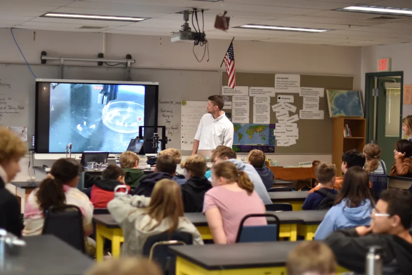 Dr. Carlos Garciamendez-Mijares presents in front of the science classes.